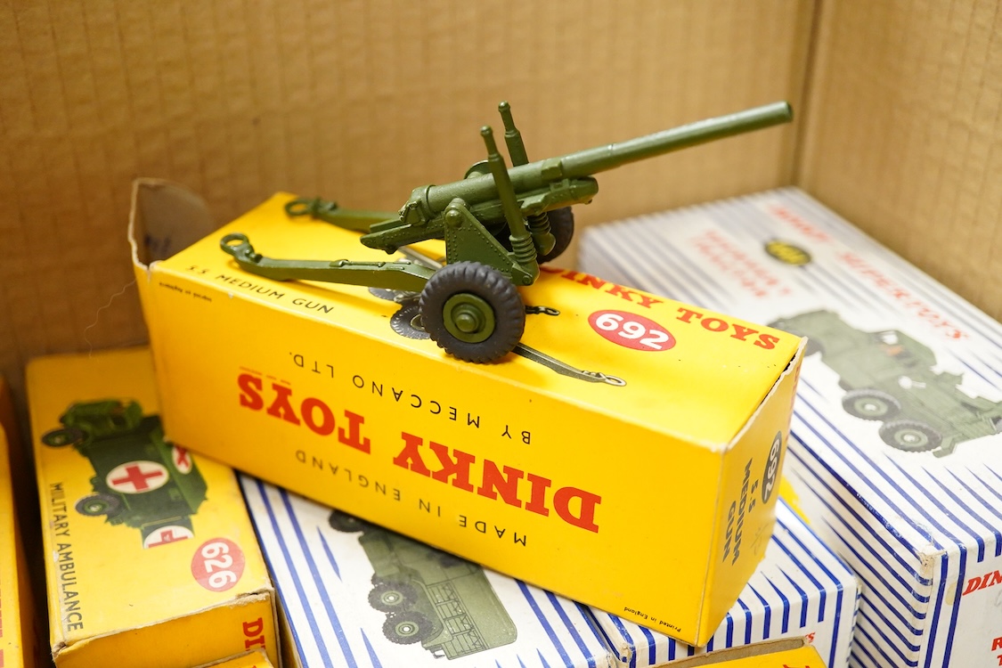 Fifteen boxed military Dinky Toys and Supertoys including; Recovery Tractor (661), 10-ton Army Truck (622), Military Ambulance (626), Army Water Tanker (643), etc. plus three unboxed vehicles, together with two Matchbox